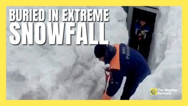 Snowbanks Tower Over Doorways After Record Snowfall in East Russia