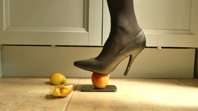 Heels Crush Apples on an Android Phone