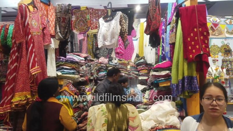 People showing their interest in buying Gujarati handmade products in IITF Prahgati Madin