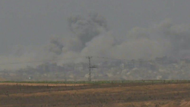 Heavy smoke billows amid Israeli operations and aid airdrops in central Gaza | AFP