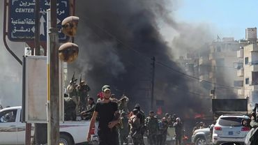 Smoke, gunfire as Syrian forces enter Druze city after deadly clashes | AFP