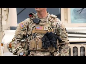 National Guard units begin carrying weapons in Washington