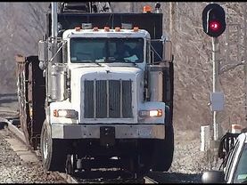 Peterbilt Truck Pulling a Train Car