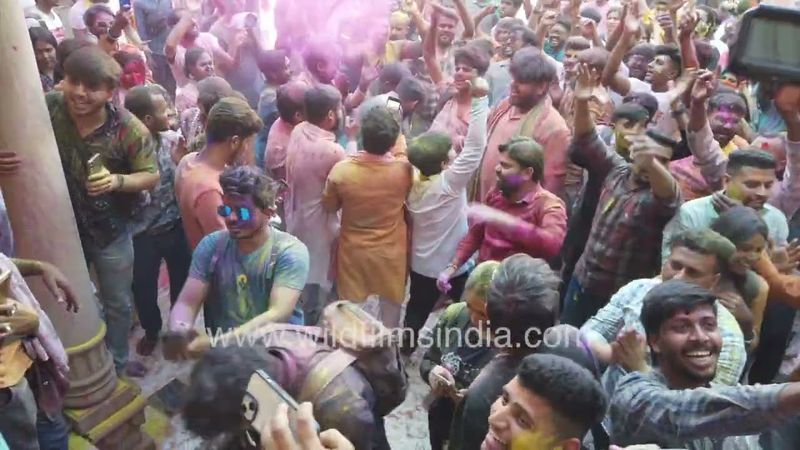 Devotees playing Holi inside the Shree Gopinath Temple, Vrindavan, Uttar Pradesh