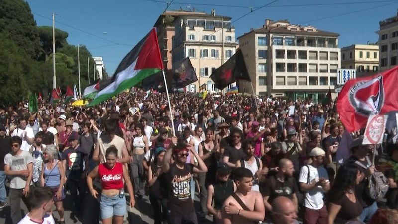 Thousands march in Rome against security clampdown law | AFP
