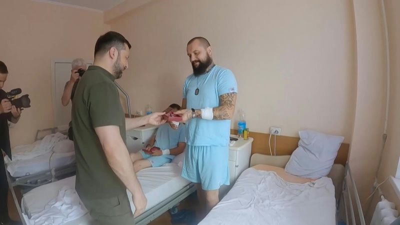Zelensky awards wounded Ukrainian soldiers in Kharkiv hospital | AFP
