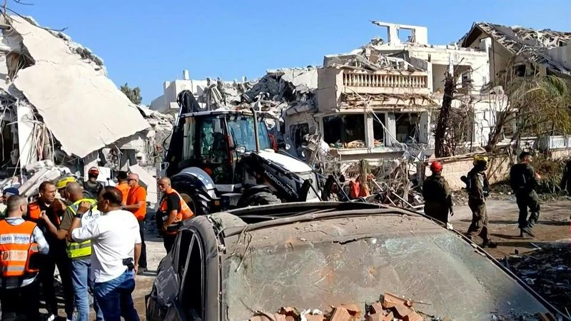 First responders on site of Iranian missile strike in central Israel | AFP