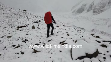 Climbing in blackout conditions, under overcast skies, heading to Kalindi Khal in Uttarakhand