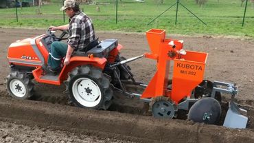 Planting potatoes with a mini tractor in different countries of the world