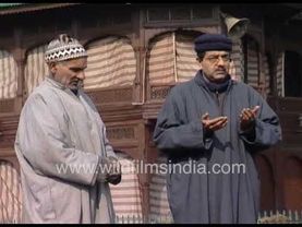 Young Kashmiri boys offer respects at Graveyard near Shah-e-Hamdan Mosque in Srinagar Kashmir