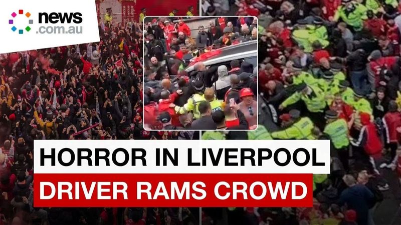 Horrifying scenes as Liverpool fans clash with police after driver ploughs through crowd