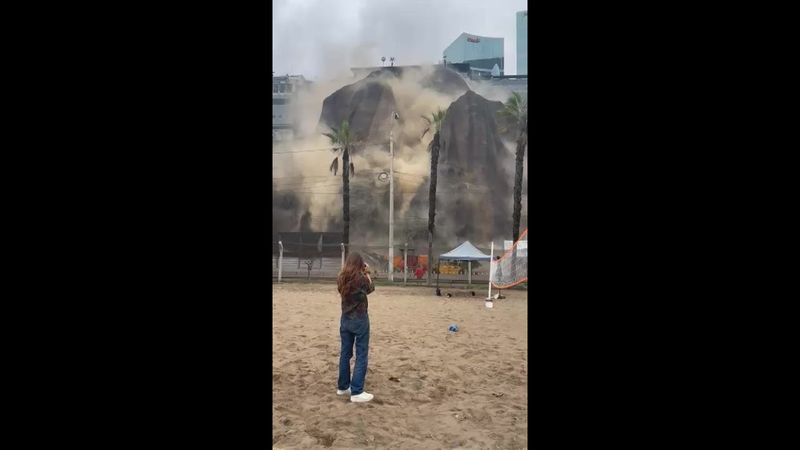 Dust, sand rise from cliffs of Lima's coast after 6.1 earthquake | AFP