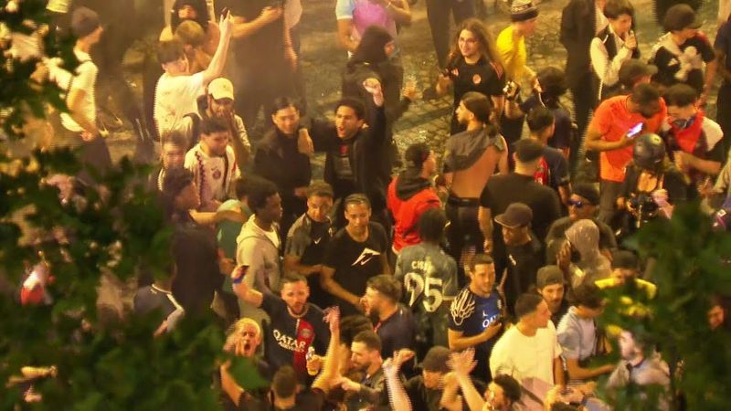 Fans on Champs-Elysees go wild as PSG win Champions League | AFP