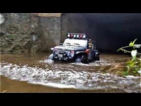 RC Car Traction Hobby Founder Jeep Riding a valley rock under the bridge