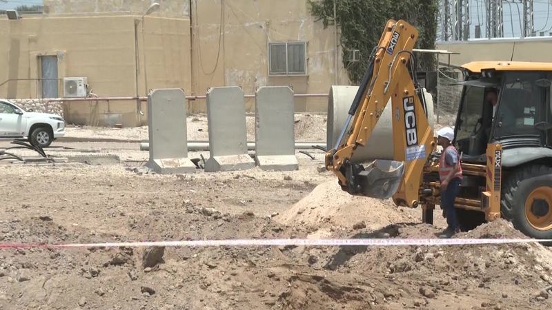 Excavator at site of Iranian missile strike in southern Israel | AFP