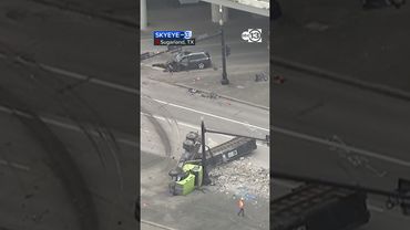 Overturned 18-wheeler with lost load of gravel shuts down US-59 SB frontage road at Crabb River