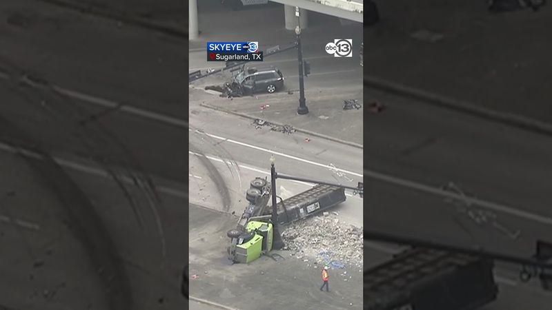 Overturned 18-wheeler with lost load of gravel shuts down US-59 SB frontage road at Crabb River