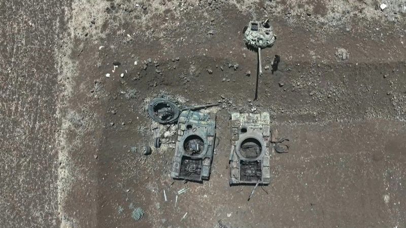 AERIAL SHOTS: Destroyed Syrian tanks, Israeli outpost in south | AFP
