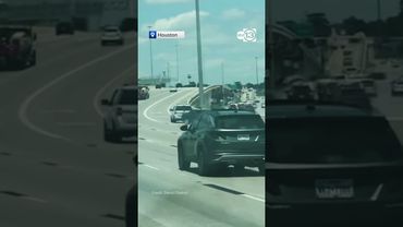 Wild raw video of convertible towed backwards skidding on 290 and then 610 in Houston.