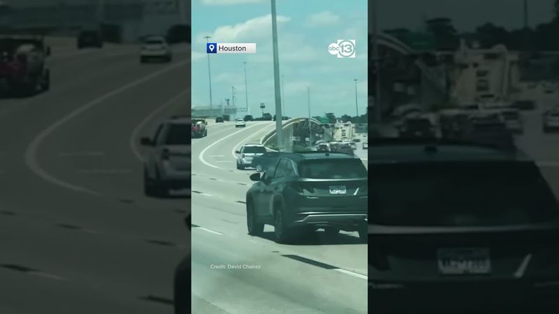 Wild raw video of convertible towed backwards skidding on 290 and then 610 in Houston.