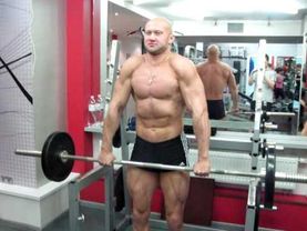 Упражнения для трапеции. Шраги со штангой стоя. Техника выполнения.