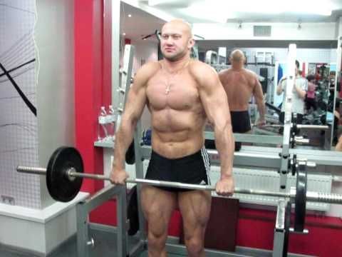 Упражнения для трапеции. Шраги со штангой стоя. Техника выполнения.