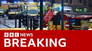 Man arrested after car hits pedestrians at Liverpool FC Premier League title parade | BBC News