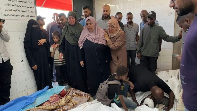 Gazans mourn loved ones killed in Israeli strike on their home in Deir el-Balah | AFP
