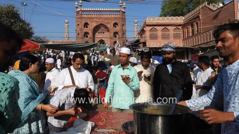 Muslims of India eat vermicelli or siwai on Eid festival at Jama Masjid in Old Delhi