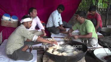 Langar during Durga puja festival, people are standing in line to take the food near Safdarjung