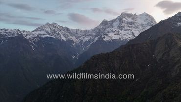 Chaukhamba flight from Madhyamaheshwar in Uttarakhand, with overcast skies in aerial view