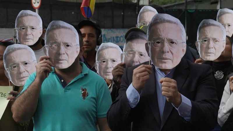Supporters of Colombian ex-president outside court ahead of witness tampering case verdict | AFP