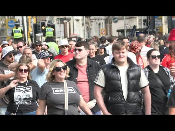 Oasis fans gather ahead of first gig of reunion tour in Cardiff | AFP