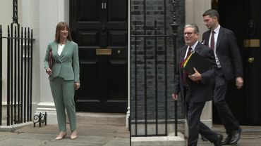 UK Finance Minister and Prime Minister leave Downing Street for spending review | AFP