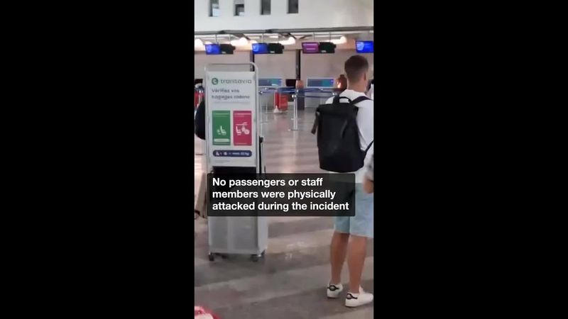 Tourists flee as man sets bins on fire and destroys airport property