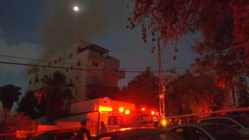 Smoke rises from site of Iranian strike in central Israel | AFP