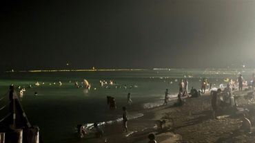 Dubai residents cool off as UAE hits record May temperature of 51.6C | AFP