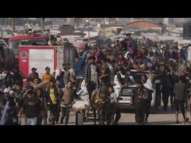 Dozens killed and scores injured in shooting near aid point in Gaza