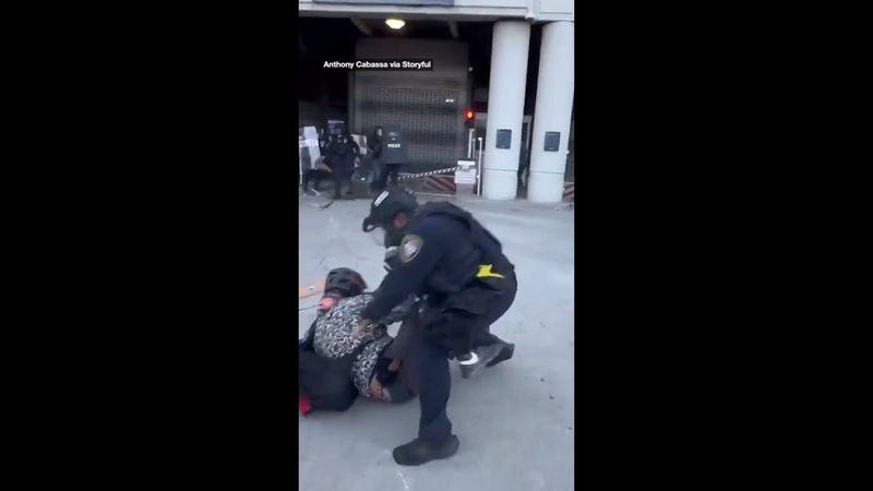 Protest over ICE raids turns violent as demonstrators clash with police