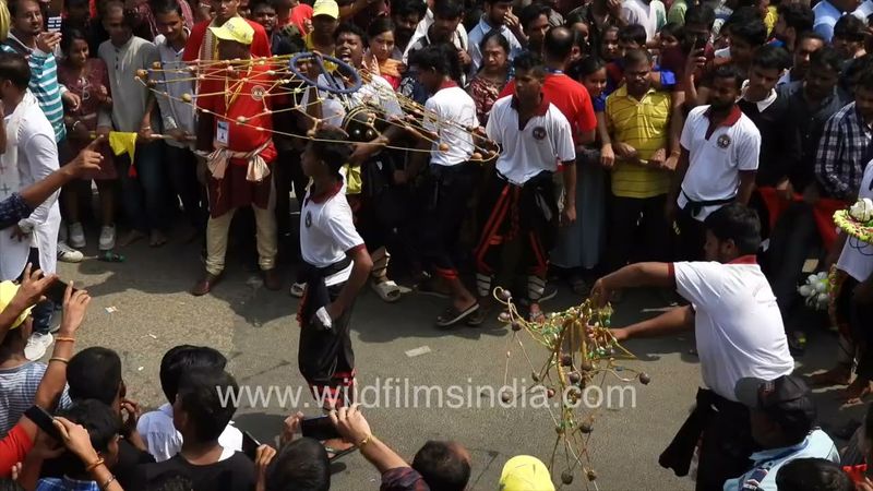 Some people are showcasing their actions during the Rath Yatra at Jagannath Mandir in Hauz Khas