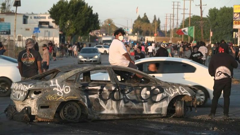 US demonstrators protest immigration enforcement raids in Los Angeles suburb | AFP