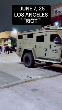 Protesters shout "ICE out of LA" and chase after HSI vehicles leaving...