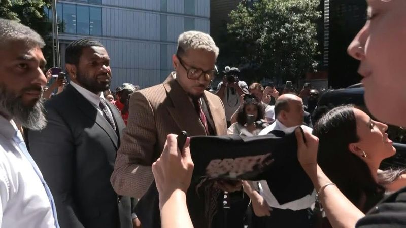 US R&B singer Chris Brown leaves UK court after denying more charges in assault case | AFP