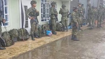 Images of Colombian soldiers detained by locals in guerrilla-held region | AFP