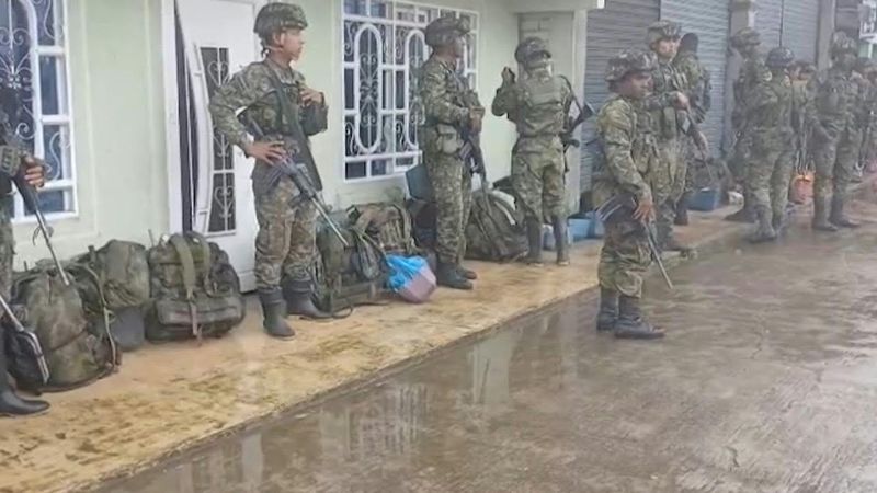 Images of Colombian soldiers detained by locals in guerrilla-held region | AFP