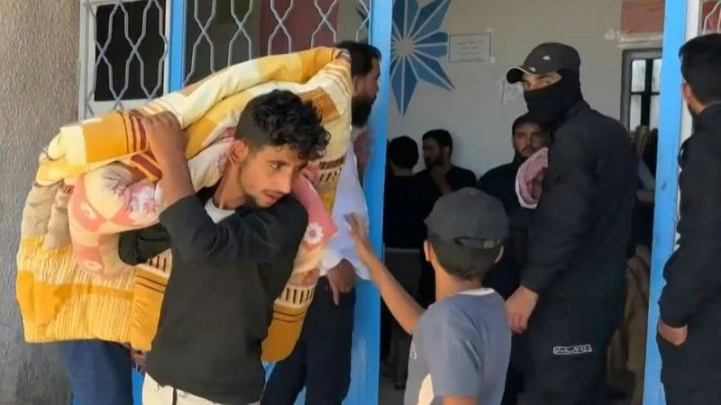 Syrian Bedouin families arrive at shelter after evacuating violence-hit Sweida | AFP