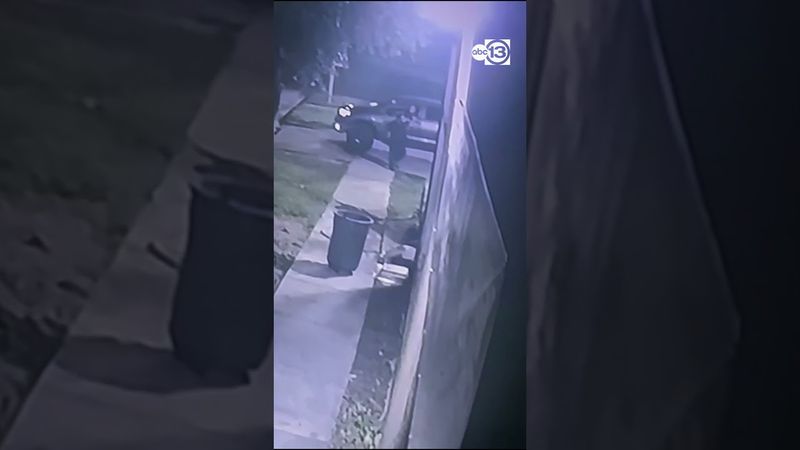 Man pressure washing outside of restaurant shot by driver, video shows
