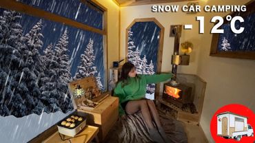 A small truck loaded with a projector and a wood stove. Spending a day in the snow at -12°C