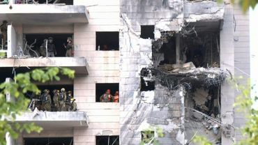 Rescue teams search the rubble at site of Iranian missile strike in central Israel | AFP