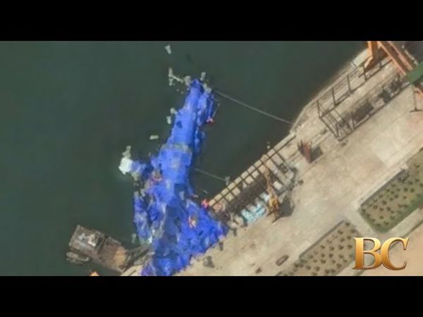 North Korea detains three over warship launch accident, state media reports